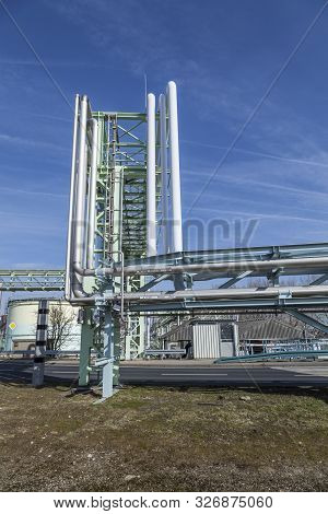 Frankfurt, Germany - Mar 6, 2013: Industry Park In Frankfurt Hoechst With Pipelines  Under Blue Sky