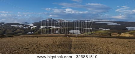 Colorful Rhyolit Landmannalaugar Mountain Panorma With Multicolored Volcanos And Footpath Of Laugave