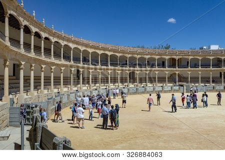 Ronda, Spain - May 17, 2018:  Visitors To The Plaza De Toros Or Bullring. The Bullring At Ronda Is T