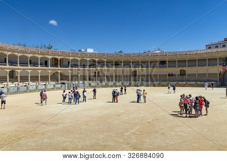 Ronda, Spain - May 17, 2018:  Visitors To The Plaza De Toros Or Bullring. The Bullring At Ronda Is T