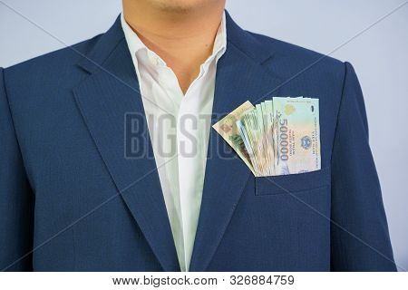 Money In Vietnam Hold On Hand Business Man Wearing A Blue Suit (socialist Republic Of Vietnam), Dong
