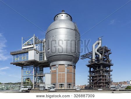 Neunkirchen, Germany - Aug 5, 2018: Old Iron Works Monuments In Neunkirchen From The Late 20th Centu