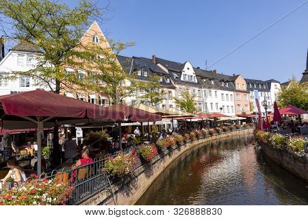 Saarburg, Germany - Aug 28, 2018: City Center Of Saarburg With Creek And Restaurants At The Promenad