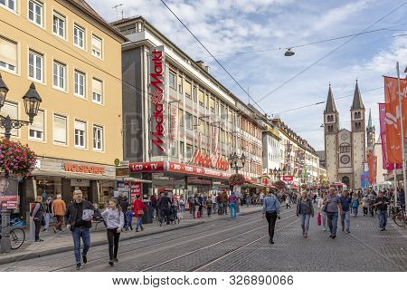 Wuerzburg, Germany - Oct 6, 2018: People Visit The Pedestrian Zone  In Wuerzburg, Germany. This Zone