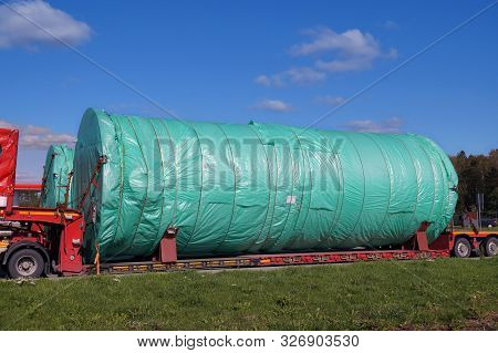 A Truck With A Special Semi-trailer For Transporting Oversized Loads. Oversize Load Or Exceptional C