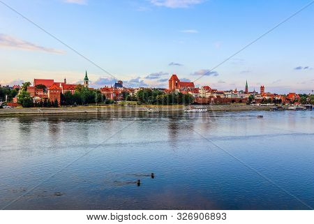 Panoramic View Of Torun City And Wisla (vistula) River At Sunset. Poland, Summer 2019
