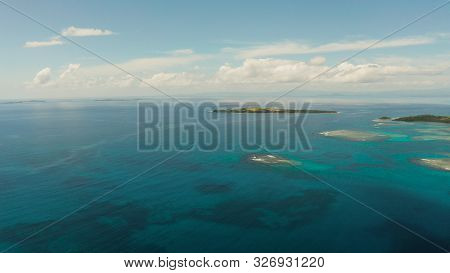 Tropical Islands In Turquoise Lagoon And Coral Reef Water, Aerial View. Bucas Grande, Philippines. S