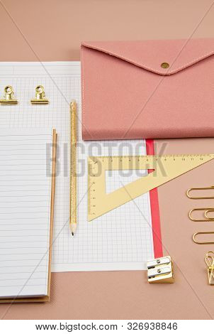 Top View Over Notepad And Golden Office Suplplies. Working Space, Studies, Office Desk, Home-office 