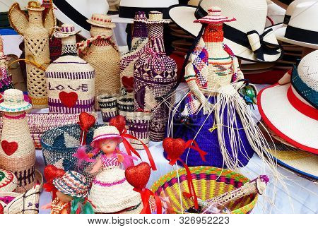 Cuenca, Ecuador-march 8, 2019: Wicker Souvenirs: Baskets, Dolls, Bottles, Vases, Hats Made From Toqu