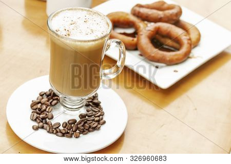 Enjoying coffee with milk and dessert, time for coffee