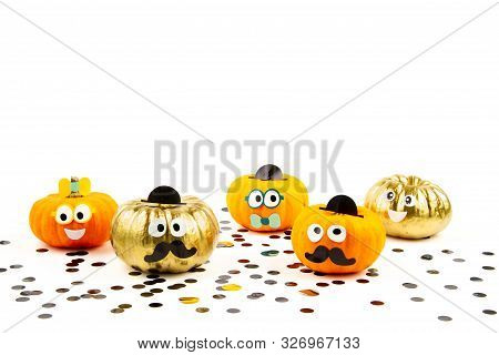 Funny Pumpkins With Googly Eyes Over The White Background. Funny, Halloween Celebration Concept