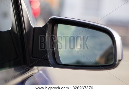 Side Rear View Mirror On The Car