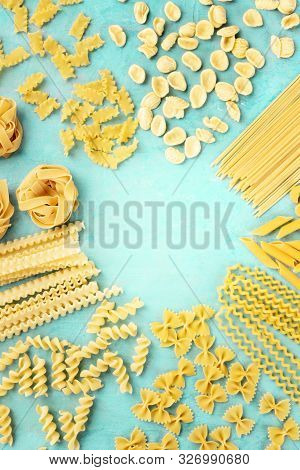 Italian Pasta, Flat Lay Design Template With Copyspace, Overhead Shot On A Blue Background