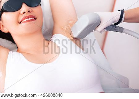 Young Girl Close-up Receiving Laser Epilation Of The Armpit