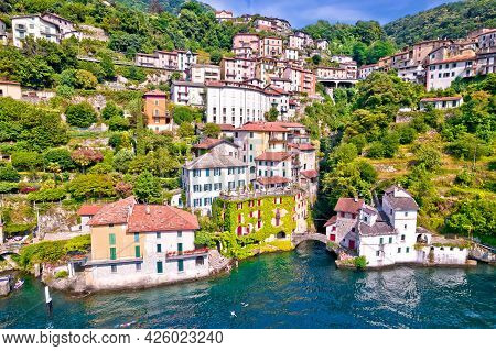 Town Of Nesso On Steep Cliffs And Creek Waterfall On Como Lake Aerial Waterfront View, Lombardy Regi