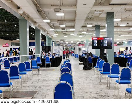 Selangor, Malaysia - July 6,2021 : Public People Can Seen Waiting Patiently In The Hall For Their Tu