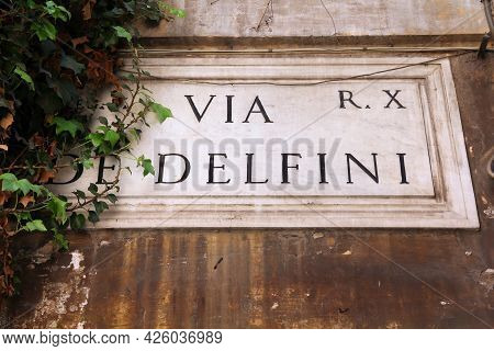 Rome Detail. Via De Delfini - Old Street Name Sign In Rome, Italy. Campitelli District (rione Campit
