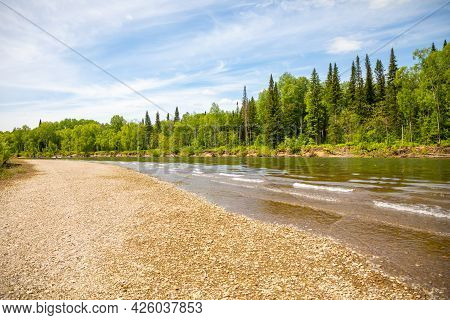 River Taidon Flowing Through The Taiga Forests, South Siberia, Russia