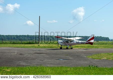Gorodok. Ukraine. June 6, 2021. Tsuniv Airfield. Training Aircraft, Taxiing To The Runway. Sport Ext