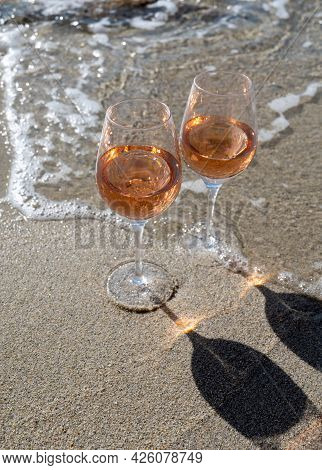 Summer Time In Provence, Two Glasses Of Cold Rose Wine On Sandy Beach Near Saint-tropez, Var Departm