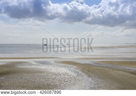 Wadden Sea At Low Tide With Dry Pieces Of Mudflats Seen From The Wadden Island Of Terschelling