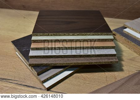 Samples Of Fibreboard Panels With Wood Texture. Laminated Cpd. Chipboard Pvc Edge. Wooden Furniture 