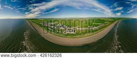 Aerial drone view of Allonby village beach in Allerdale district in Cumbria, UK