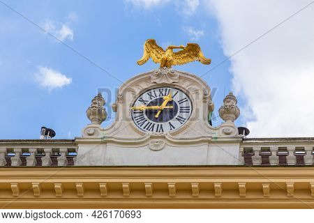 Vienna, Austria - 6 April 2015 - Close Up Of The Famous Schonbrunn Palace Clock Against Blue Sky On 