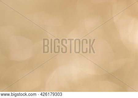Blurry golden glitter background texture