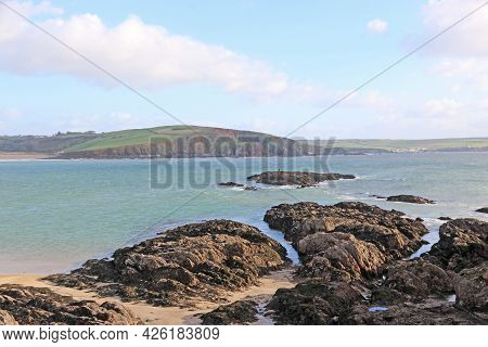 Rocks On Bigbury Beach, Devon, At Low Tide