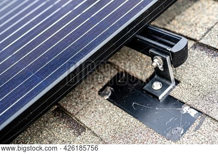 Rail, Bracket, And Anchor To A Solar Panel Installed On A Asphalt Shingle Roof