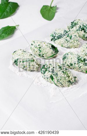 Cooking Gnudi With Ricotta And Spinach. Italian Meal