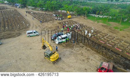 Aerial View Of Funeral Procession At Rorotan, North Jakarta. Special Graves Infected With The Corona