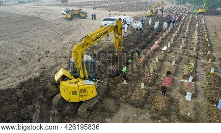 Aerial View Of Funeral Procession At Rorotan, North Jakarta. Special Graves Infected With The Corona