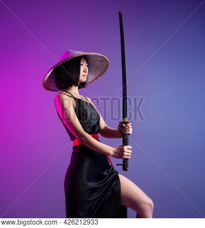 Slender Asian Woman An Asian Hat With A Katana In Her Hand Image Of A Samurai