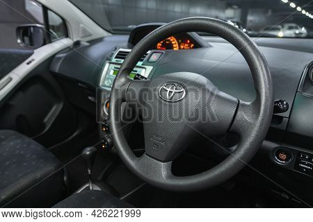 Novosibirsk, Russia - June 29, 2021: Toyota Vitz, Car Interior With Dashboard, Steering Wheel, Speed