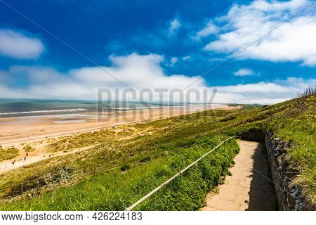 Sunny Cliffs and beach at Blackhall Rocks and Cromdon Dene Beach
