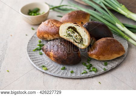Russian Pastries (pirogi) Filled With Eggs And Green Onion