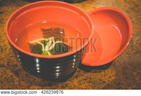Japanese Miso Soup With Seaweed In A Black Bowl, Asian Style