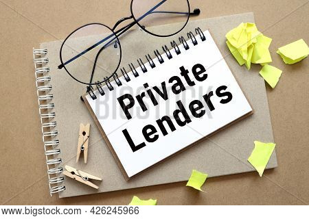 Private Lenders. Text On White Paper On Notepad. On Craft Background