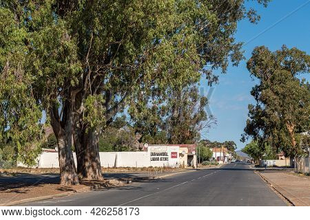 Touws River, South Africa - April 20, 2021: A Street Scene, With Buildings, People And Vehicles, In 