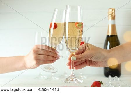 Female Hands Cheers With Rossini Cocktails, Close Up