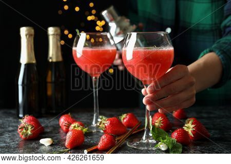 Concept Of Making Rossini Cocktails Against Dark Background