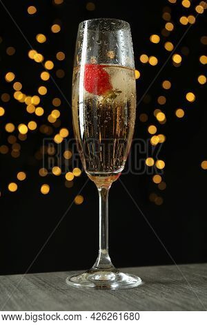Concept Of Delicious Drink With Rossini Cocktail On Background With Blurred Lights