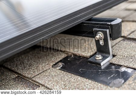 Rail, Bracket, And Anchor To A Solar Panel Installed On A Asphalt Shingle Roof