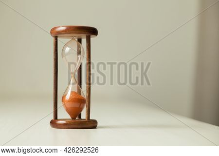 Hourglass With Concept Of Passing Time, Race Against Time, Urgency And Priority. Hours, Days, Weeks,