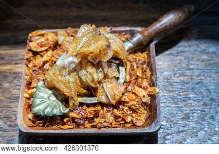 Dried Chilli Paste With Crispy Fish Thai Style Or Crispy Fish Chilli Paste On Wooden Bowl. Thai Food