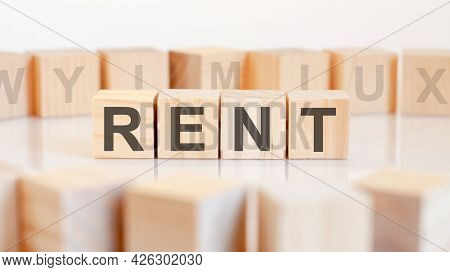 Rent Word From Wooden Blocks With Letters, Rent Or Doing Business Concept, Random Letters Around, Wh