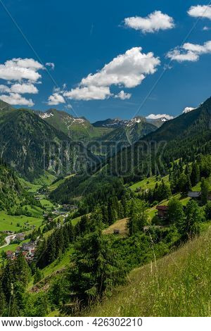 Summer Valley With Grossarler Ache Small River And Blue Cloudy Sky