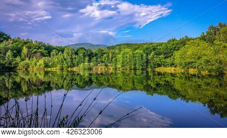 Summer Landscape Of Mountain Lake At Sunset